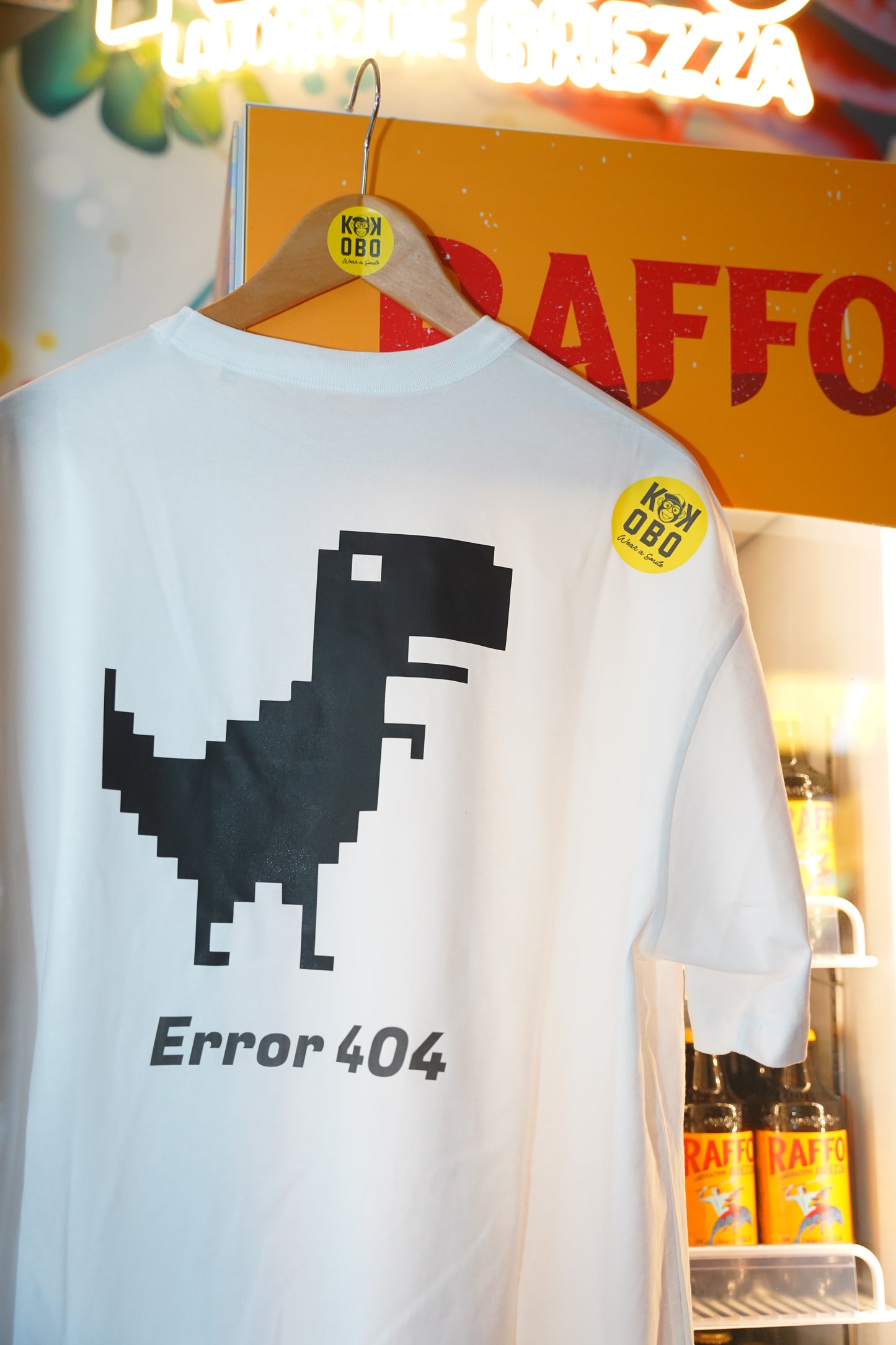 KOKOBO T-Shirt "Error 404" - Oversized Bianca Dinosauro Pixel Art Tech Humor 13°