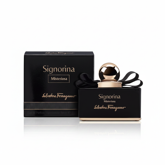 Salvatore Ferragamo Signorina Misteriosa Eau de Parfum - flacone nero con tappo dorato e confezione nera su sfondo bianco