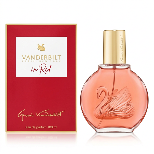 Flacone corallo con tappo dorato e scatola rossa Gloria Vanderbilt In Red Eau de Parfum 100 ml su sfondo bianco