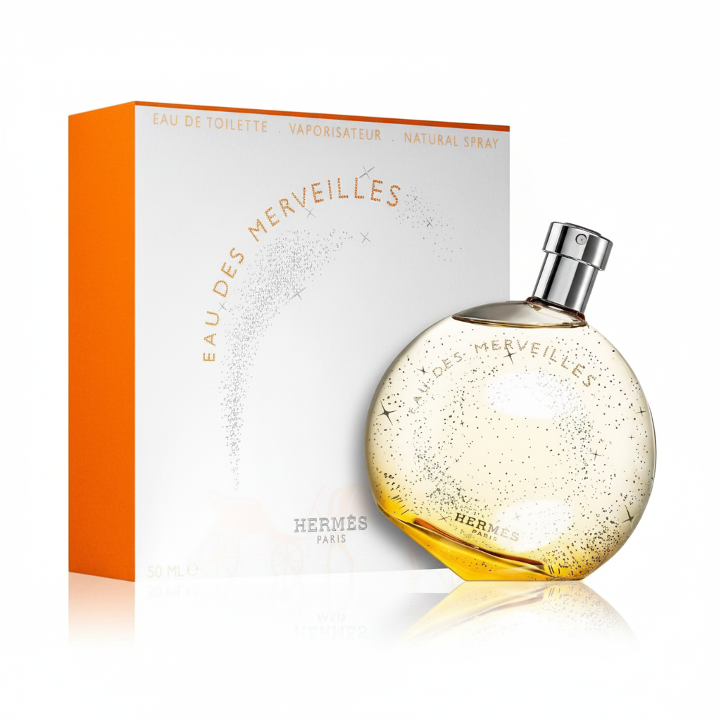 Hermès Eau des Merveilles EDT 100ml – flacone rotondo ambrato con confezione arancione su sfondo bianco