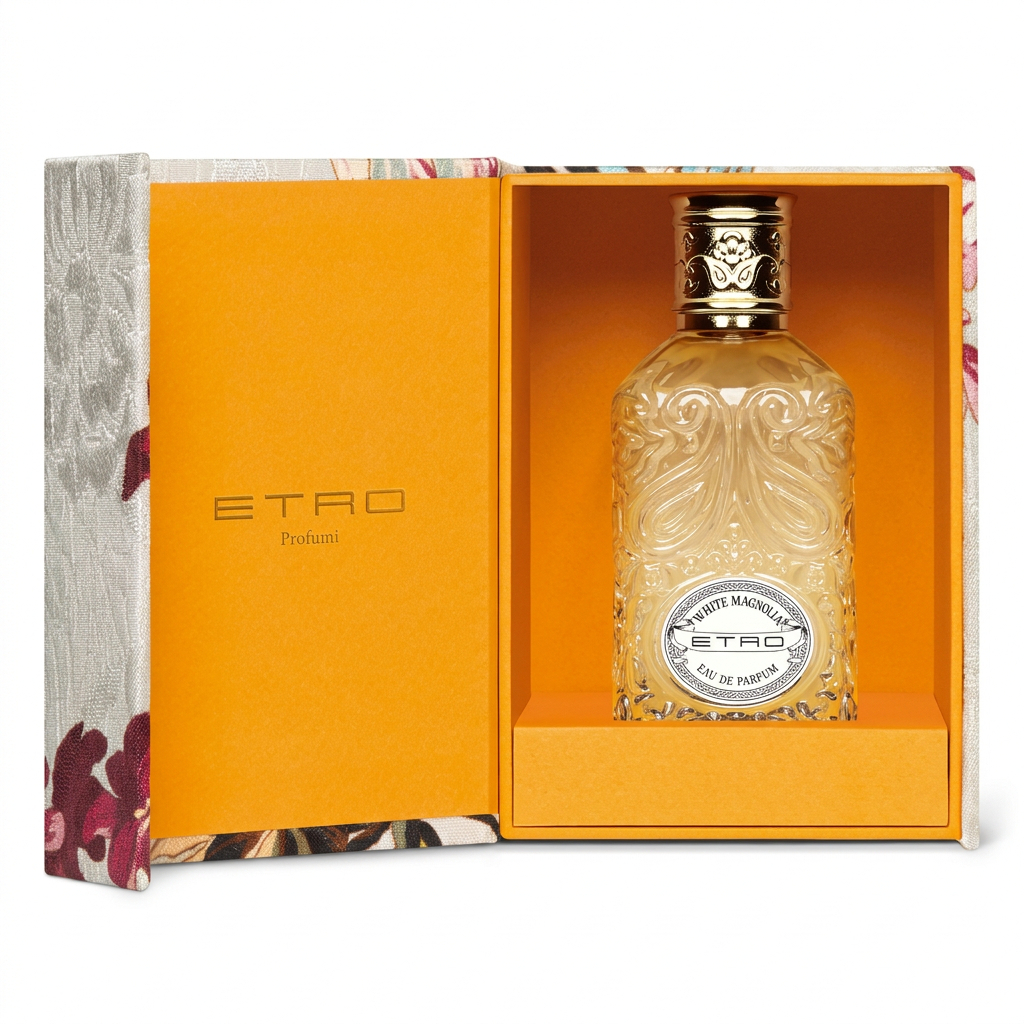 Etro White Magnolia Eau de Parfum nella confezione aperta con interno arancione su sfondo bianco